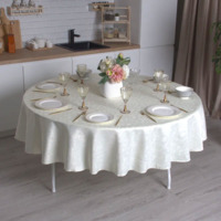 صورة المنتج مفرش طاولة دائري، قطر 2200 مم، موديل زهورافينكا، تصميم أحرف متشابكة باللون الشامبانيا من شركة تشيدوكوفر.