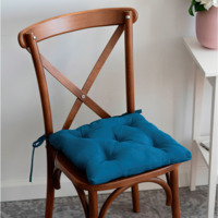 Product photo KARAT chair cushion, turquoise from the ChiedoCover company.